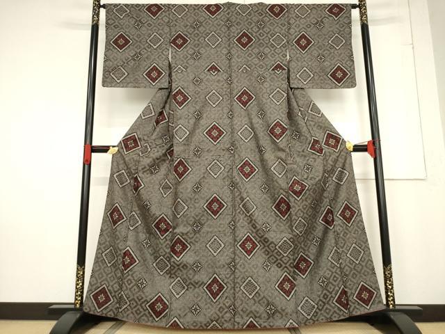 平和屋着物●本場大島紬　龍郷絣　花菱文　正絹　逸品　AABF0951ck
