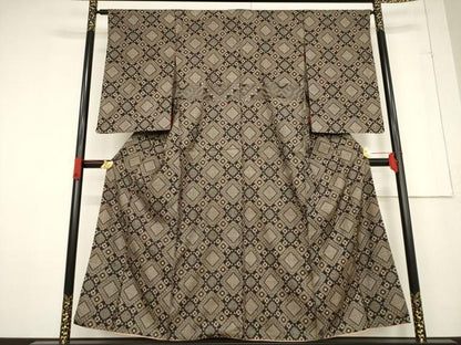平和屋着物●本場大島紬　龍郷絣　花菱文　正絹　逸品　AABF0952ck