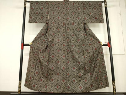 平和屋着物●本場大島紬　龍郷絣　花菱文　正絹　逸品　AABF0960ck