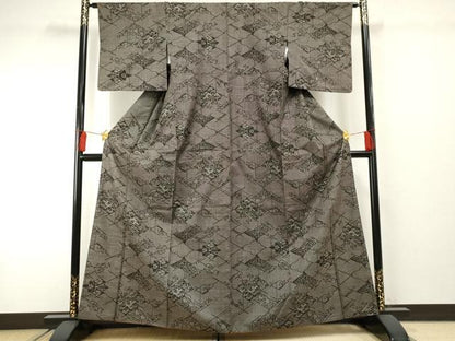 平和屋着物●本場大島紬 泥染め 一元7マルキ 花唐草松文 そごう扱い 正絹 逸品 AABF2946cs