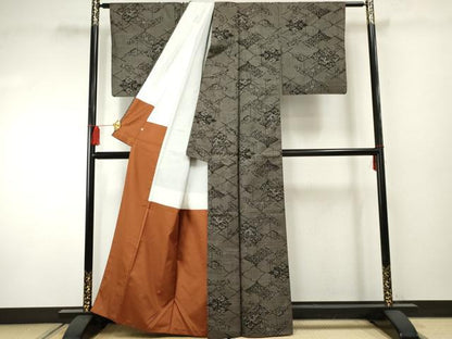 平和屋着物●本場大島紬 泥染め 一元7マルキ 花唐草松文 そごう扱い 正絹 逸品 AABF2946cs