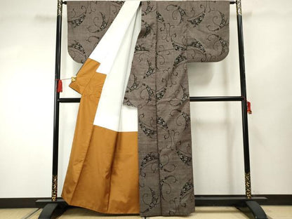 平和屋着物●本場大島紬 泥染め 一元7マルキ 花唐草文 正絹 逸品 AABF4288cs