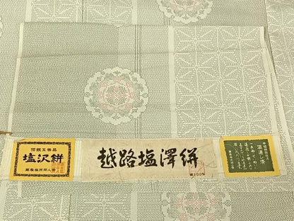 平和屋着物▽越路塩澤絣 単衣 110亀甲 雪輪花文 反端付き 正絹 逸品 AABF6430jh