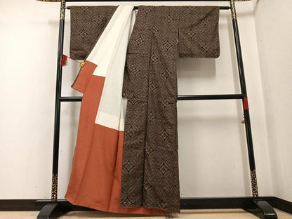 平和屋着物●本場大島紬 古代染色純泥染め 一元7マルキ 七宝文 高文助作 証紙付き 正絹 逸品 未使用 AABF6965ph