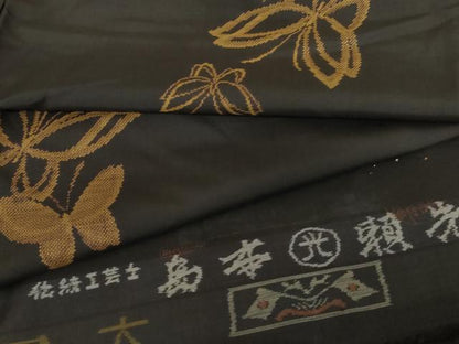 平和屋着物●伝統工芸士　島本瀬光　本場大島紬　地空き　カタス9マルキ　舞蝶文　黒地　証紙付き　正絹　逸品　AABG0299cs