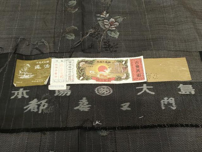 平和屋着物●都喜ヱ門 本場大島紬 泥染め 手織り カタス7マルキ 総絣 枝花間道 藤絹織物謹製 証紙付き 正絹 逸品 未使用 AABG0309cs