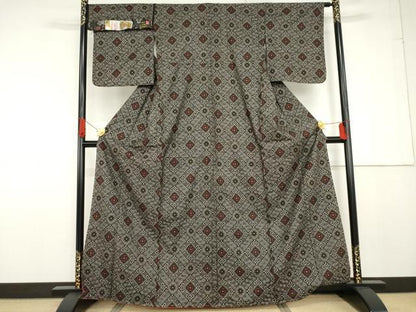 平和屋着物●本場大島紬　龍郷絣　手織り　花菱文　前田織物謹製　証紙付き　正絹　逸品　未使用　AABG0324cs