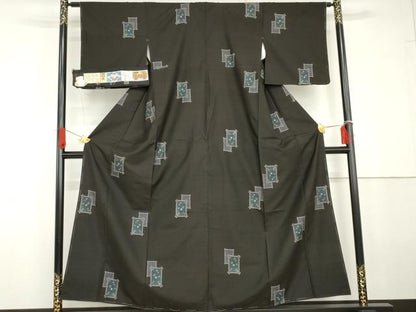 平和屋着物●本場大島紬　純泥染　カタス9マルキ　地空き　色紙重ね文　黒地　興紬商店謹製　証紙付き　正絹　逸品　未使用　AABG6601cs