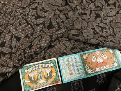 平和屋着物●本場大島紬　古代染色純泥染　カタス7マルキ　草花文　カネトク謹製　証紙付き　正絹　逸品　未使用　AABG7337ph
