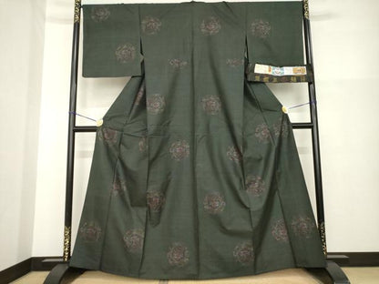 平和屋着物▽本場大島紬 単衣 純泥染め 手織り 9マルキ 雪輪花唐草文 古山絹織謹製 証紙付き 正絹 逸品 AABG8627ck