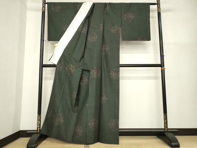 平和屋着物▽本場大島紬 単衣 純泥染め 手織り 9マルキ 雪輪花唐草文 古山絹織謹製 証紙付き 正絹 逸品 AABG8627ck