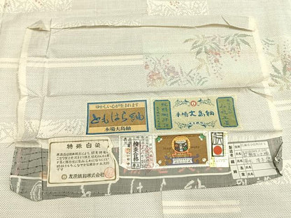平和屋着物●本場大島紬 白大島 カタス7マルキ 特殊白染 手織 色紙草花文 友原織物謹製 湯水清子作 証紙付き 正絹 逸品 未使用 AABH0529fy
