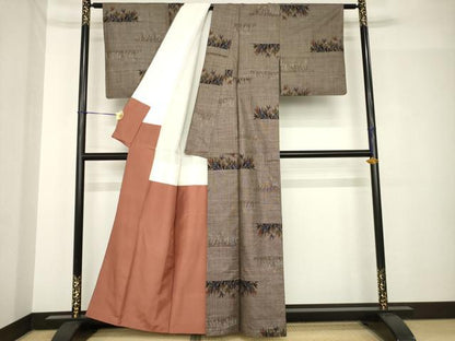 平和屋着物●本場大島紬　純泥染　手織り　カタス9マルキ　草花文　友原織物謹製　証紙付き　正絹　逸品　AABH4595ck