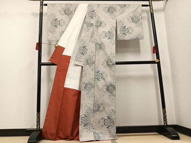 平和屋着物○本場大島紬 白大島 一元7マルキ 総絣 源氏車文