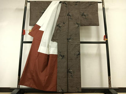 平和屋着物●都喜ヱ門　本場大島紬　泥染め　カタス7マルキ　総絣　藤絹織物謹製　手織　黄金の絆　証紙付き　正絹　逸品　AABI1285fy