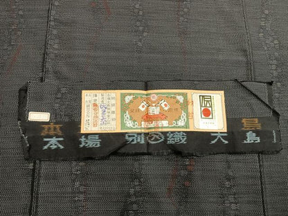 平和屋着物●本場大島紬　幾何学文様　株式会社大山謹製　証紙付き　正絹　逸品　未使用　AABI2002fy