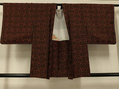 平和屋着物●本場大島紬　龍郷絣　秋名バラ　黒地　正絹　逸品　未使用　AABI3102ph