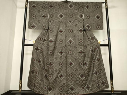 平和屋着物●本場大島紬　龍郷絣　花菱文　正絹　逸品　AABI4437ck