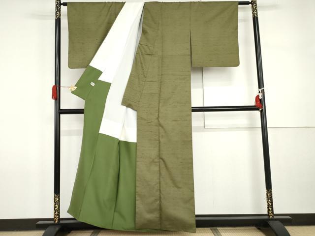 平和屋着物●石川県指定無形文化財　牛首紬　白山工房　手織り　色無地　松葉色　まるやま扱い　証紙付き　正絹　逸品　AABI5213cs