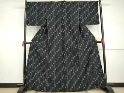 平和屋着物▽上質な紬　単衣　琉球絣文様　黒地　正絹　逸品　AABI8051cs
