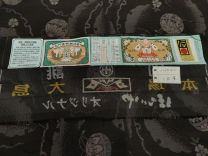 平和屋着物●本場大島紬 カタス9マルキ 泥染め 雪輪花毬文 大島紬美幸謹製 黒地 ほていや扱い 証紙付き ロング丈 正絹 逸品 AABJ0940cs