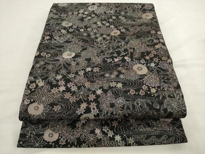 平和屋着物●染色工芸作家　本郷葵虹　九寸開き名古屋帯　流水草花文　黒地　銀通し地　正絹　逸品　AABL2507pf