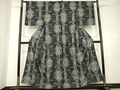 平和屋着物●アンティーク大島　本場大島紬　七宝花文　割込み絣　黒地　正絹　逸品　AABL3664ck