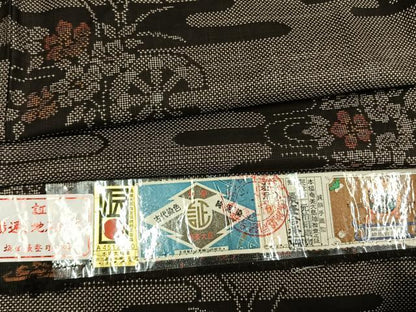平和屋着物●本場大島紬　7マルキ　古代染色　純泥染　手織　源氏車花文　元治絹織物謹製　証紙付き　正絹　逸品　AABM3864fy
