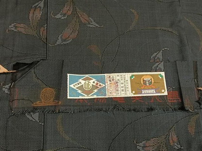 平和屋着物●本場大島紬　古代染色　純泥染　7マルキ　手織　唐草文　中村照一作　証紙付き　正絹　逸品　未使用　AABM8708fy
