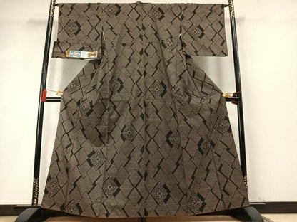平和屋着物●本場大島紬　古代染色　純泥染　7マルキ　手織　亀甲花文　福山アイ子作　証紙付き　正絹　逸品　AABN3798fy
