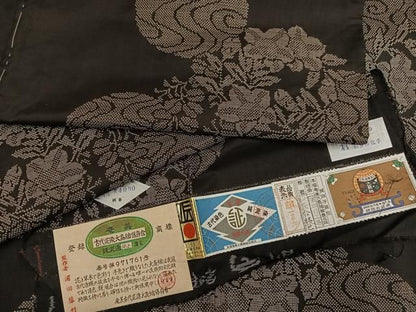 平和屋着物●本場大島紬　古代染色純泥染　7マルキ　草花丸文　浦田細工場謹製　証紙付き　正絹　逸品　未使用　AABN5745ph
