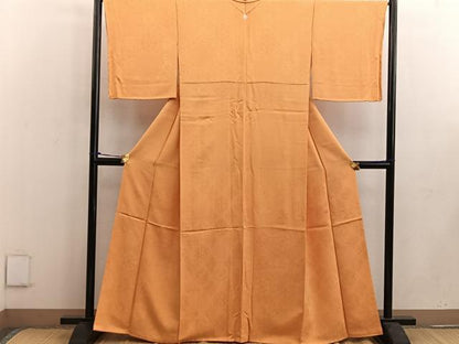 平和屋着物●上質な色無地 寿光織 草花地紋 柑子色 反端付き 正絹 逸品 未使用 BAAW3482mz