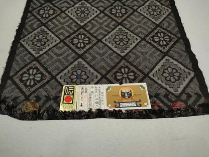 平和屋着物●本場大島紬 龍郷絣 反物 菱花文 着尺 逸品 未使用 CAAT5404th