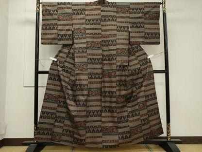 平和屋着物▽本場大島紬 単衣 7マルキ 横段更紗花文 正絹 逸品 CAAT9507dy