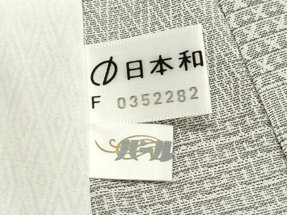 平和屋着物▽西陣　お召　単衣　作家物　80亀甲　吉祥文　反端付き　正絹　逸品　CAAV3759dy