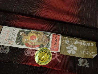 平和屋着物●都喜ヱ門　本場大島紬　泥染め　車輪梅格子　藤絹織物謹製　証紙付き　正絹　逸品　CAAY4994ut