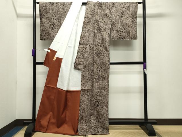 平和屋着物○本場縞大島紬 切嵌花唐草文 川野織物謹製 証紙