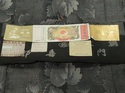 平和屋着物●都喜ヱ門 本場大島紬 9マルキ 泥染め 葡萄蔦の葉文 藤絹織物謹製 証紙付き 正絹 逸品 CABB0189gh
