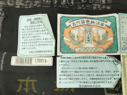 平和屋着物●本場大島紬 9マルキ 泥染め 人物文 大島紬美幸謹製 証紙付き 正絹 逸品 CABB0377gh