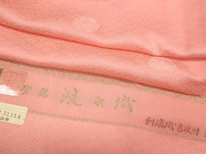 平和屋着物●上質な色無地　堅牢染　流水織　幾何学雪輪地紋　薄紅色　反端付き　正絹　逸品　未使用　CABB6339ut