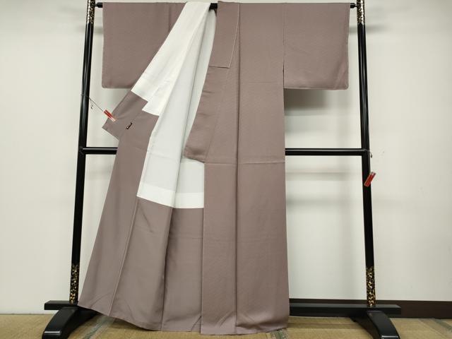 平和屋着物●上質な色無地 吉祥地紋 薄柿色 正絹 逸品 未使用 CABC2207ut
