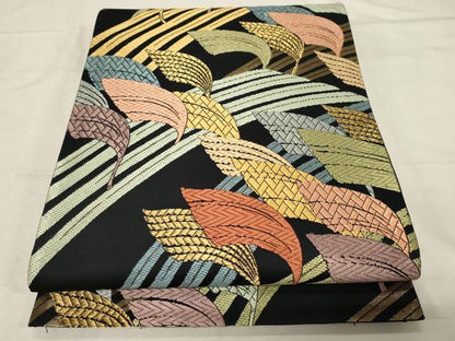 平和屋着物●六通柄袋帯 唐織 薬膳染 舞葉文 黒地 金糸 正絹 逸品 未使用 CABC4655dy