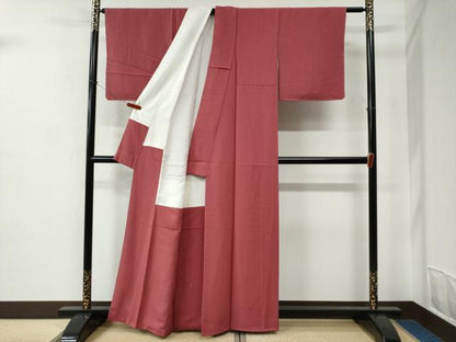 平和屋着物●上質な色無地　錦松縮緬　堅牢草木花泥染　銀朱色　反端付き　正絹　逸品　未使用　CABC6850yc
