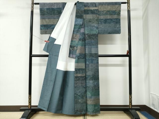 平和屋着物●本場真綿結城紬　100亀甲　飛び亀甲柄　百柄　横段風景文　証紙付き　正絹　逸品　未使用　CABC6949yc