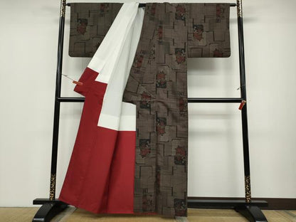 平和屋着物●本場大島紬　9マルキ　泥染め　色紙重ね花文　証紙付き　正絹　逸品　CABD0124ut