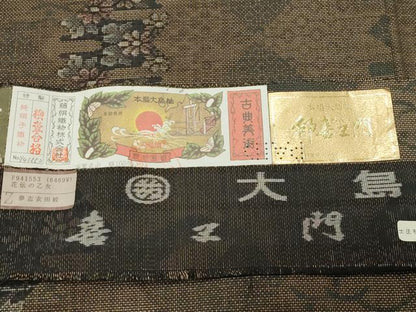 平和屋着物●都喜ヱ門　本場大島紬　9マルキ　泥染め　花伝の乙女　藤絹織物謹製　証紙付き　ロング丈　正絹　逸品　未使用　CABD8816gh