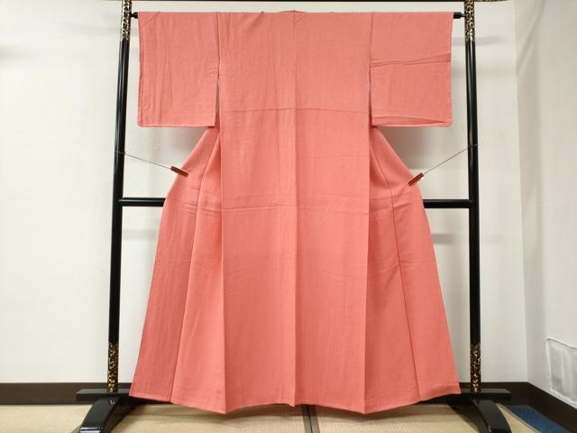 平和屋着物●上質な色無地　吉祥地紋　甚三紅色　正絹　逸品　未使用　CABE2304yc