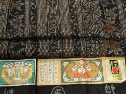 平和屋着物●本場大島紬　7マルキ　泥染め　吉祥花唐草間道　箕輪末子作　証紙付き　正絹　逸品　CABE3034yc