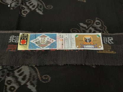 平和屋着物●本場大島紬　泥染め　地空　舞蝶文　久野織物謹製　証紙付き　正絹　逸品　CABE7185ut