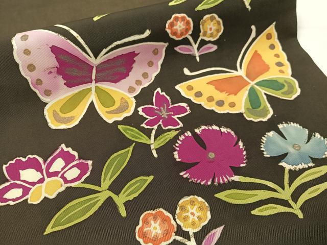 平和屋着物●塩瀬　九寸名古屋帯　ろうけつ染め　花蝶文　黒地　金彩　正絹　逸品　CABG1956vp